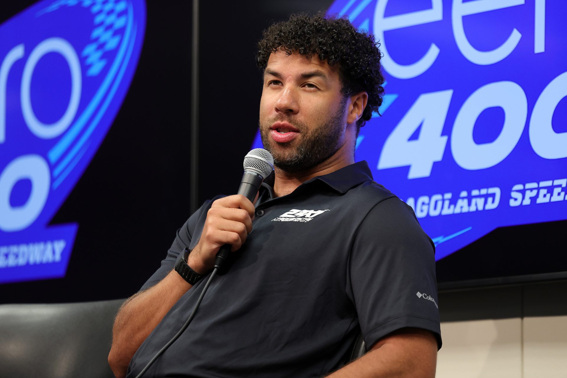 NASCAR Cup Series driver Bubba Wallace (23) speaks to the media before qualifying for the eero 400 at Chicagoland Speedway.