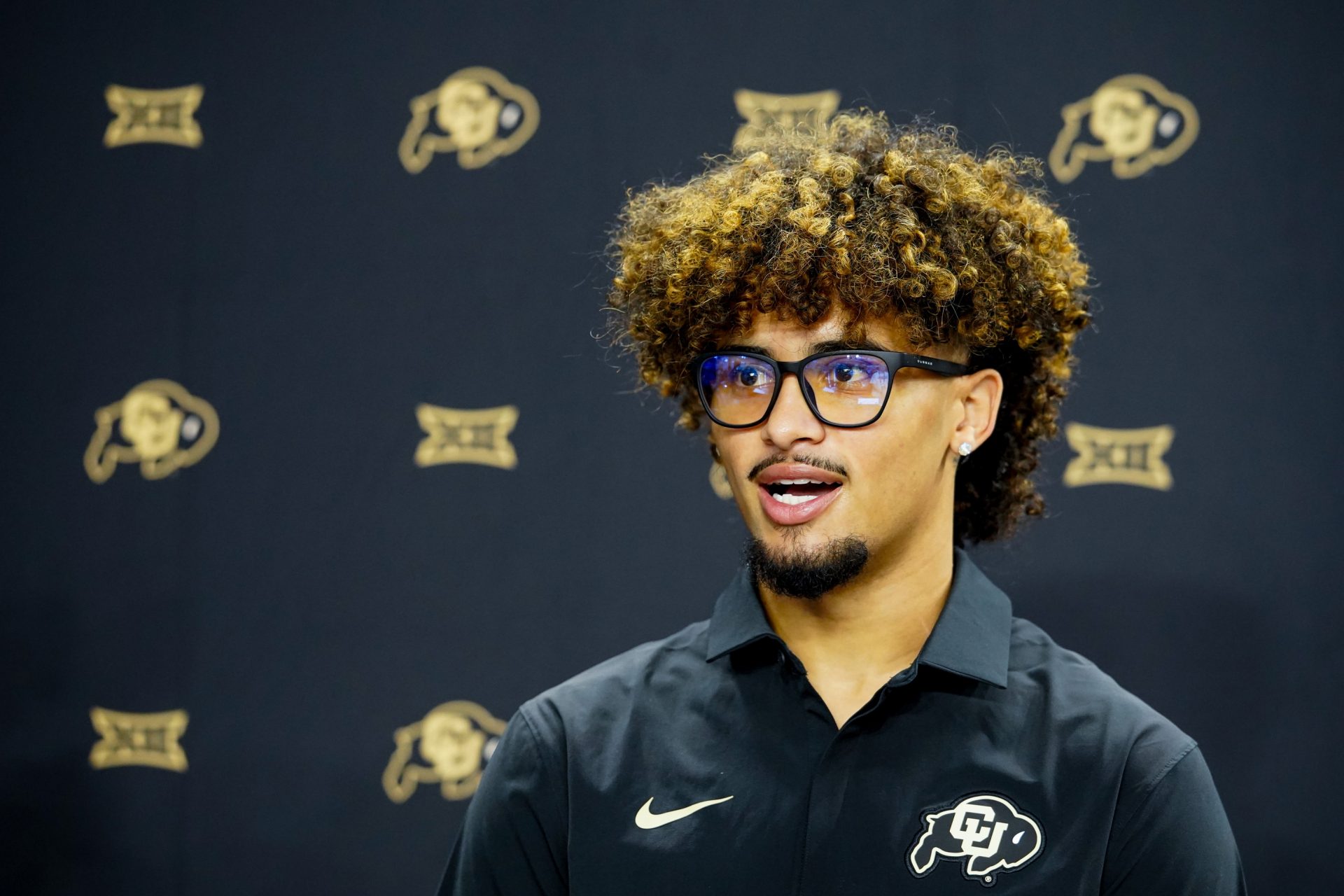 Colorado quarterback Julian Lewis speaks with  reporters during Big 12 Conference Football Media Days at The Star. 
Source: Imagn