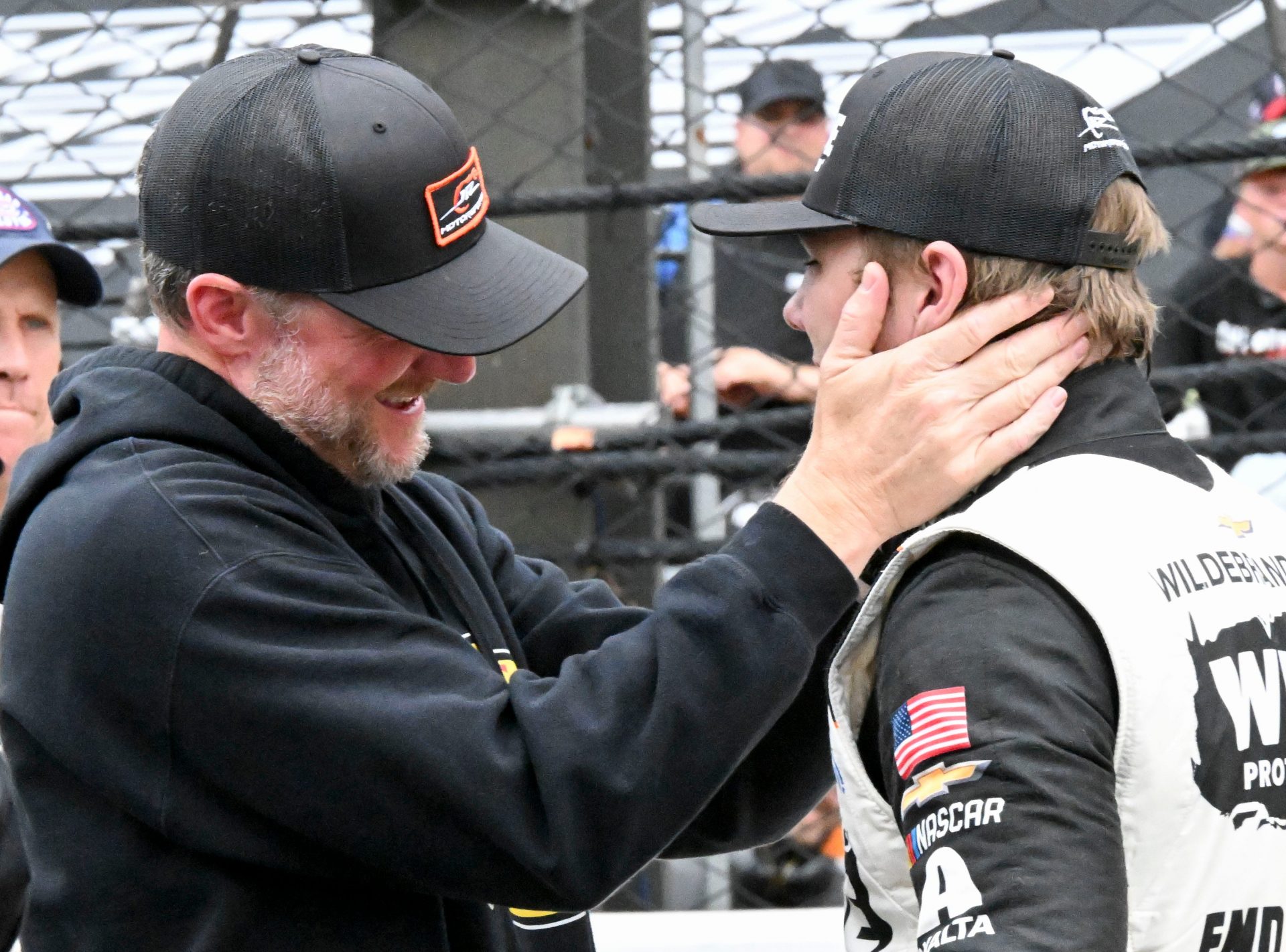 Dale Earnhardt Jr. celebrates with NASCAR O'Reilly Auto Parts Series driver Carson Kvapil (1) on Saturday, July 25, 2026, after Kvapil won the Pennzoil 250 at Indianapolis Motor Speedway.