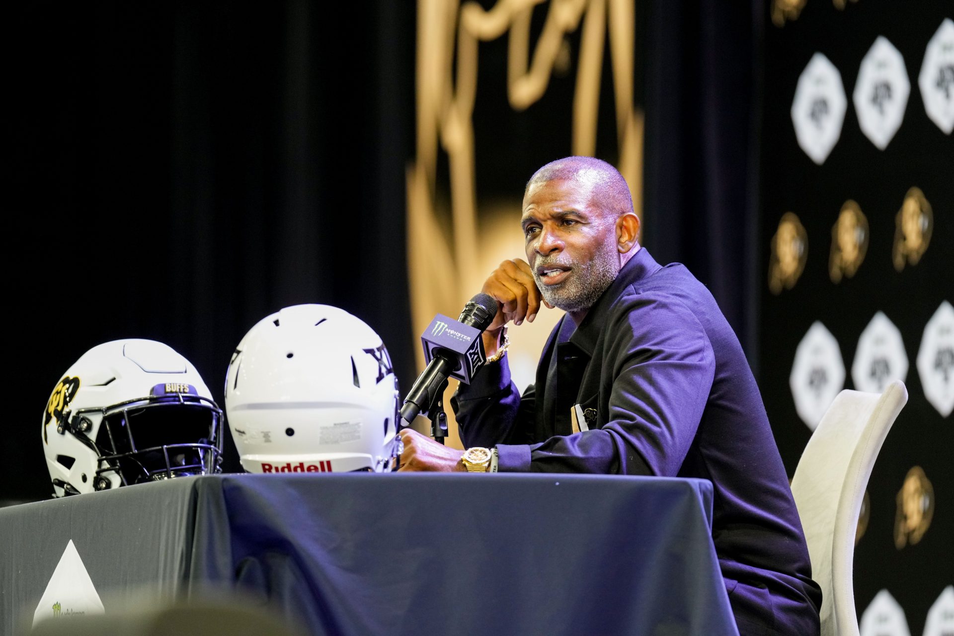 Colorado head coach Deion Sanders speaks to reporters during Big 12 Conference Football Media Days at The Star.