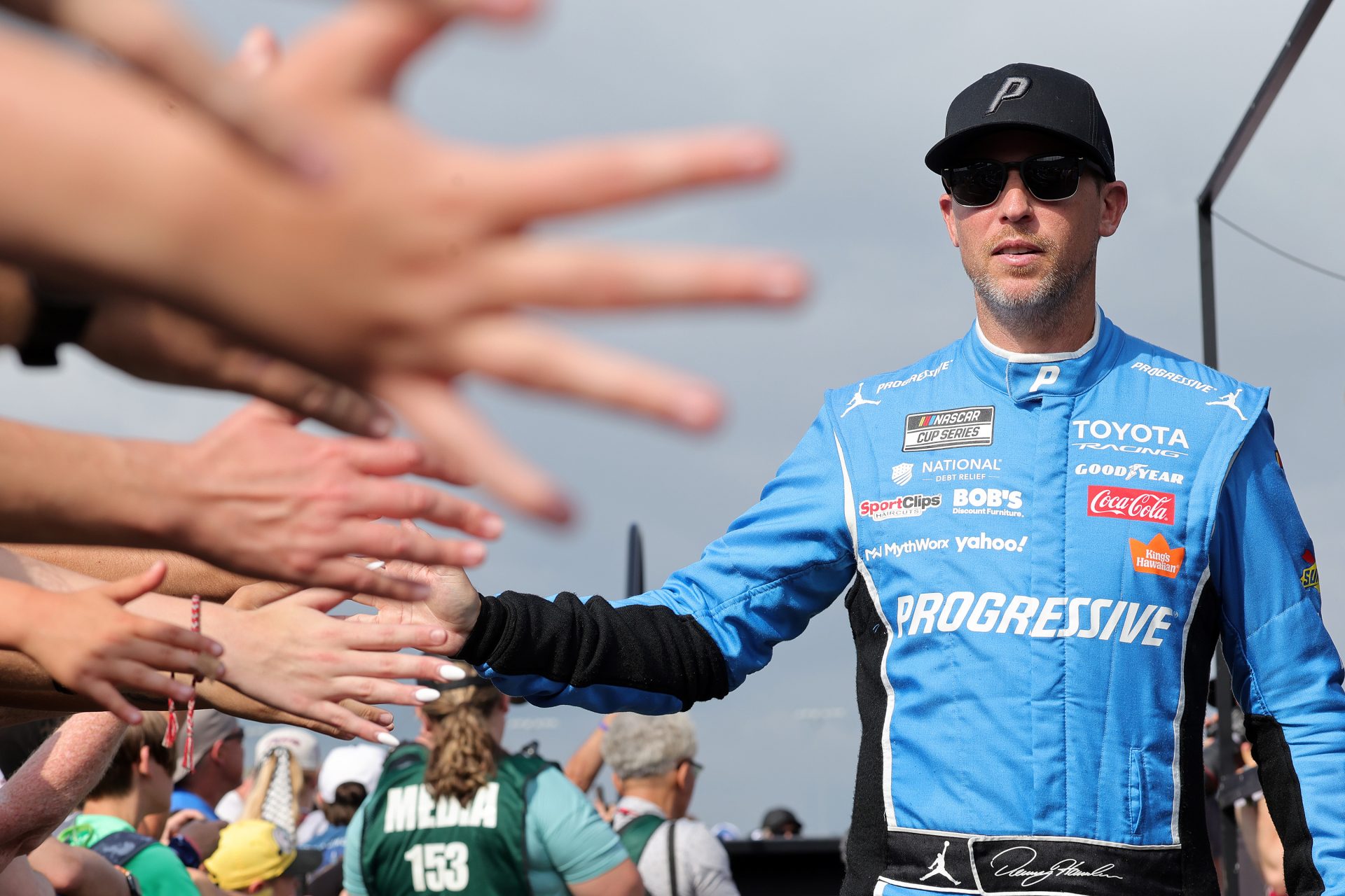 NASCAR Cup Series driver Denny Hamlin (11) shakes hands with fans before the eero 400 at Chicagoland Speedway.