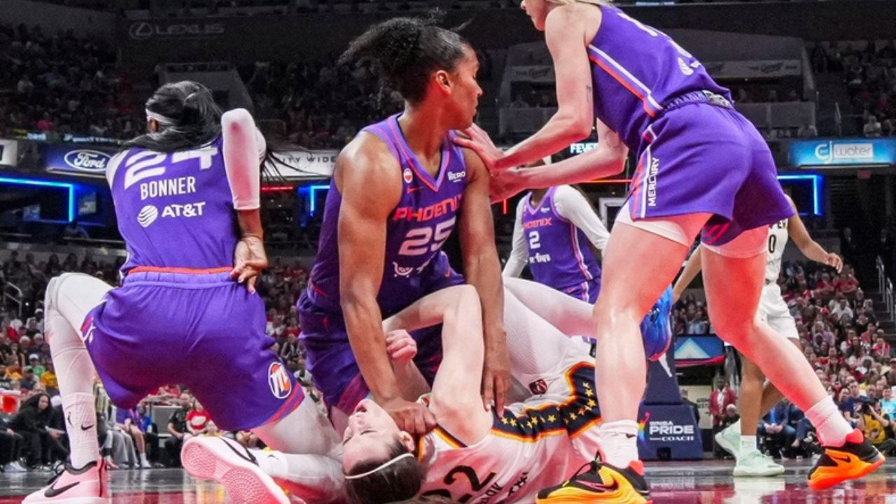Phoenix Mercury forward Alyssa Thomas (25) scrambles to get up over Indiana Fever guard Caitlin Clark (22) on Wednesday, June 24, 2026, during a game at Gainbridge Fieldhouse in Indianapolis - Source: Imagn Images