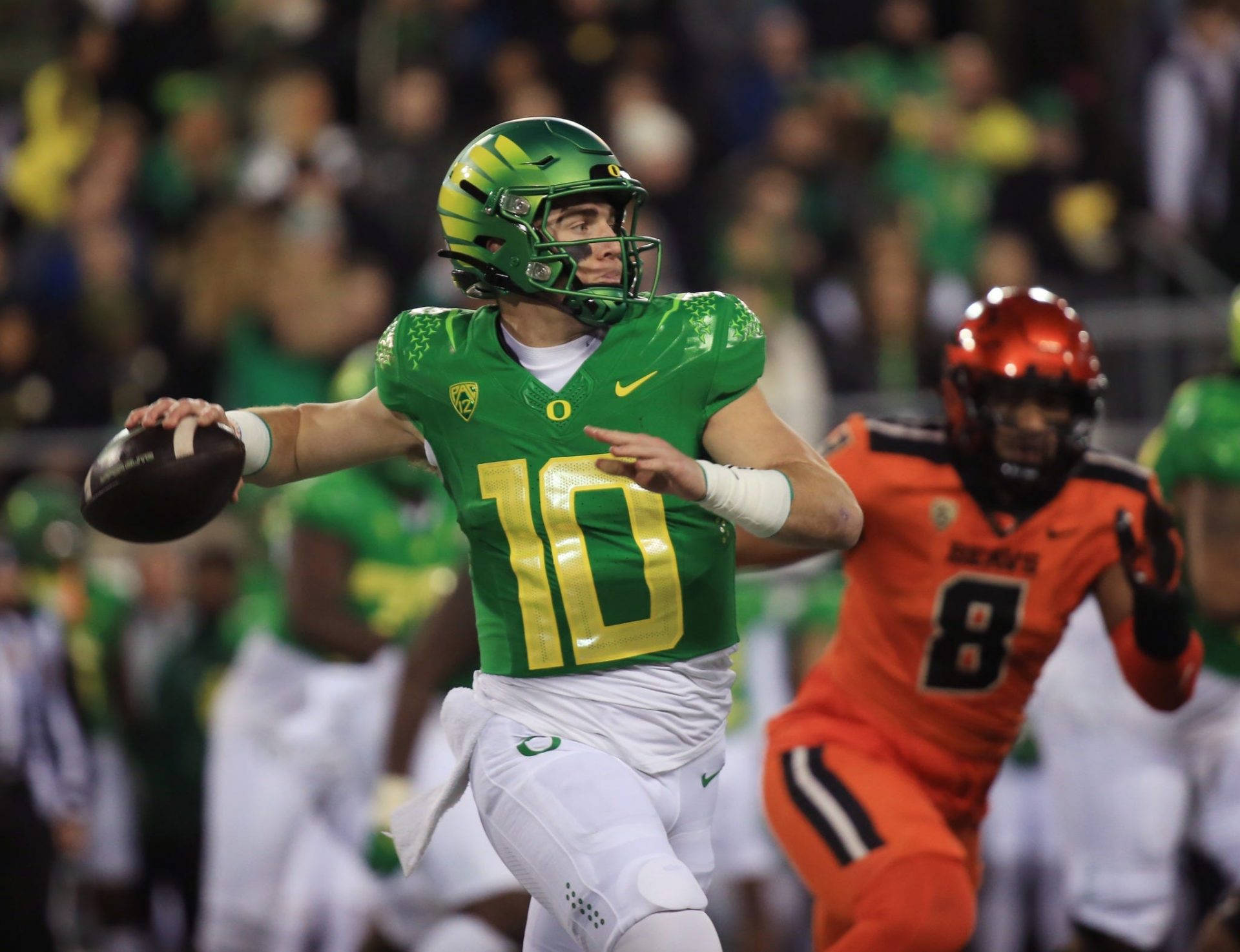 Oregon quarterback Bo Nix throws down field against Oregon State during the second quarter at Autzen Stadium. Credit: Imagn