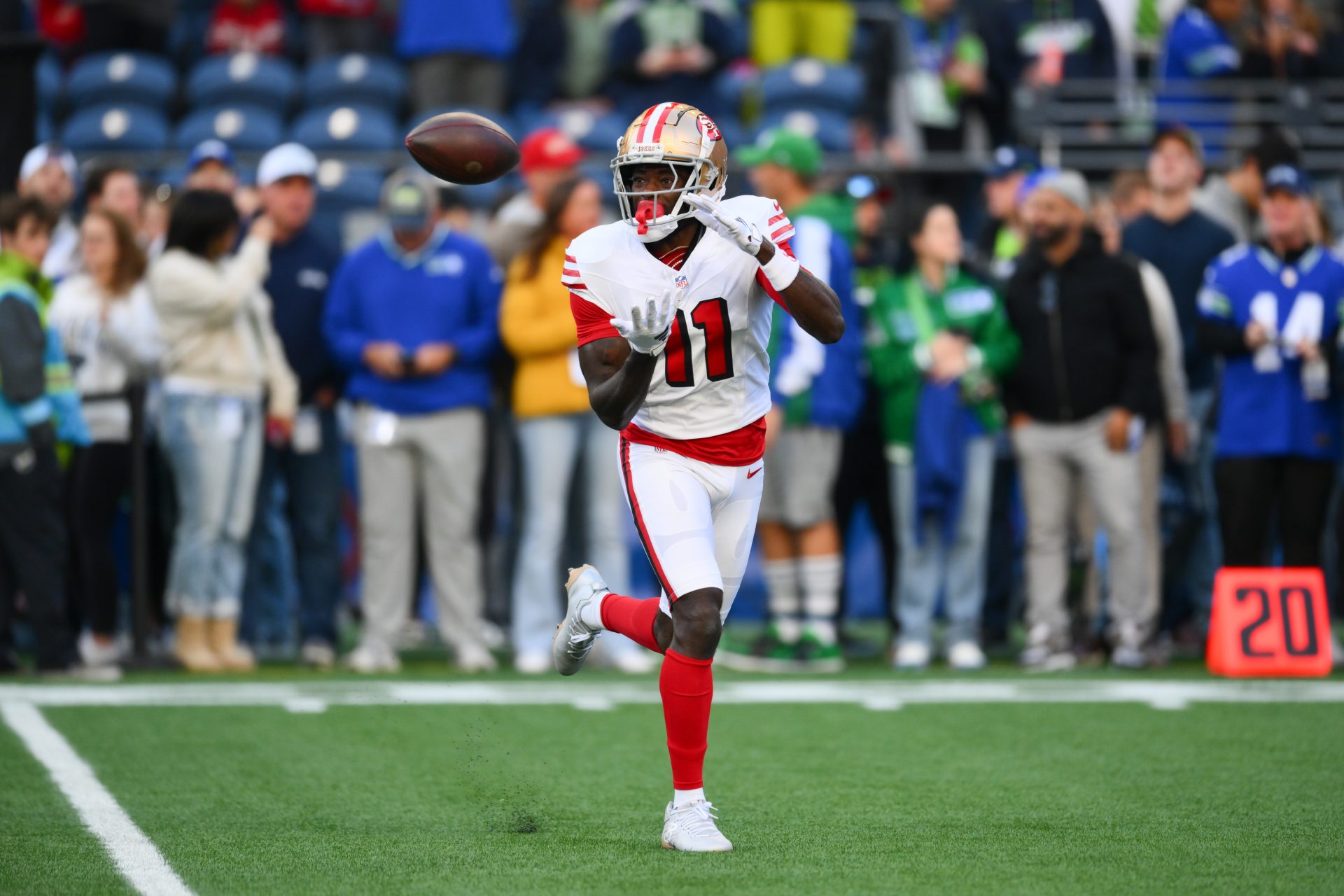 San Francisco 49ers wide receiver Brandon Aiyuk (11) catches the ball during warmups before the game against the Seattle Seahawks at Lumen Field. Source: Imagn