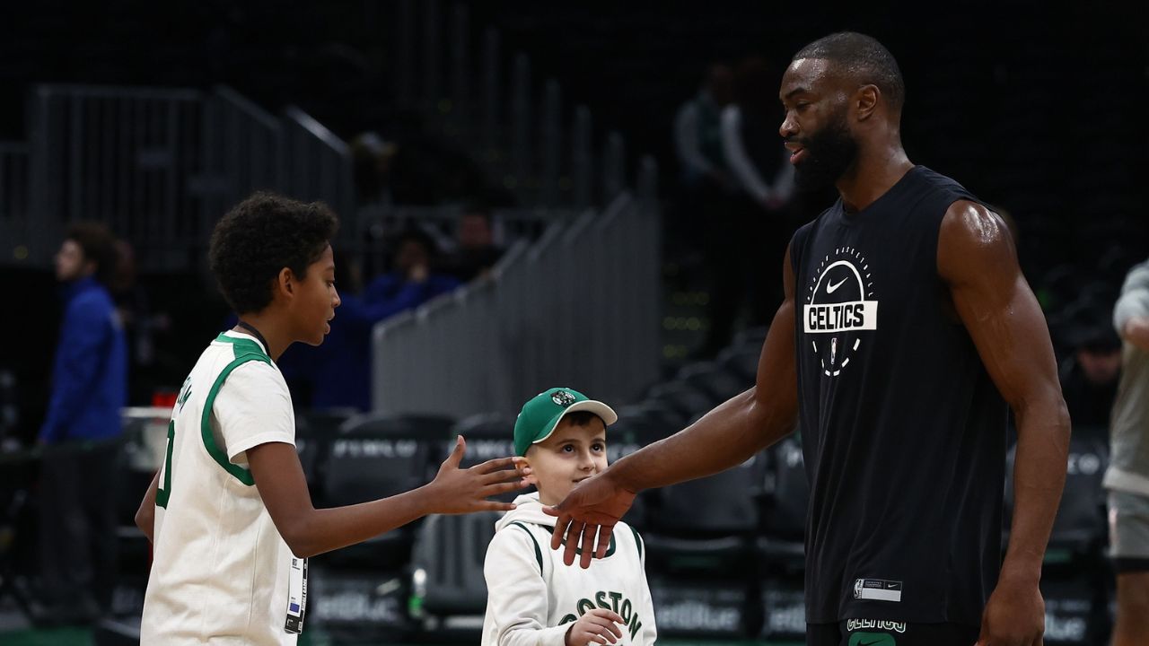 Boston Celtics guard Jaylen Brown (7) greets some young fans before their game against the Chicago Bulls - Source: Imagn Images