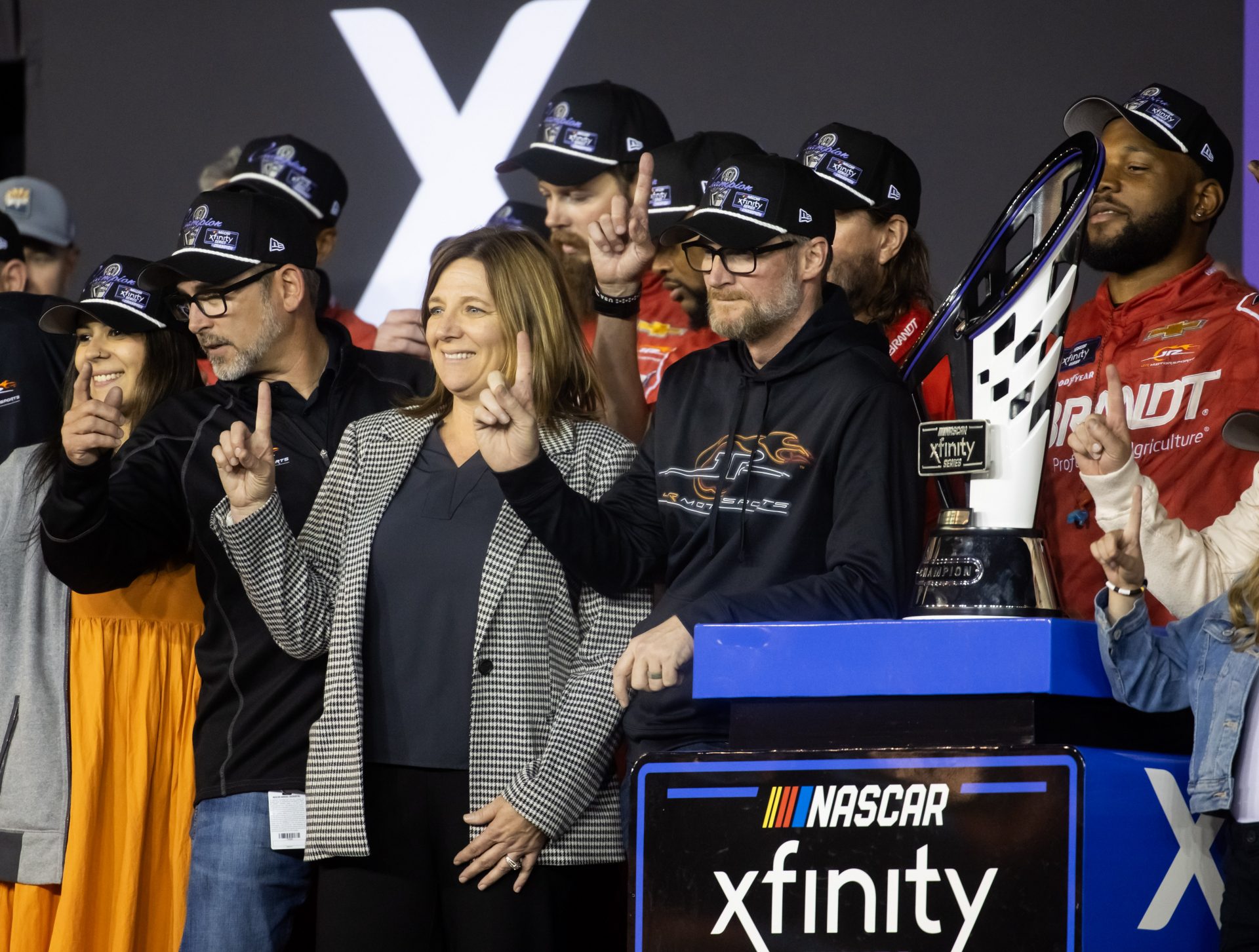NASCAR Xfinity Series team owner Dale Earnhardt Jr and sister Kelley Earnhardt Miller celebrate after winning the 2024 Xfinity Series championship during the Championship race at Phoenix Raceway.