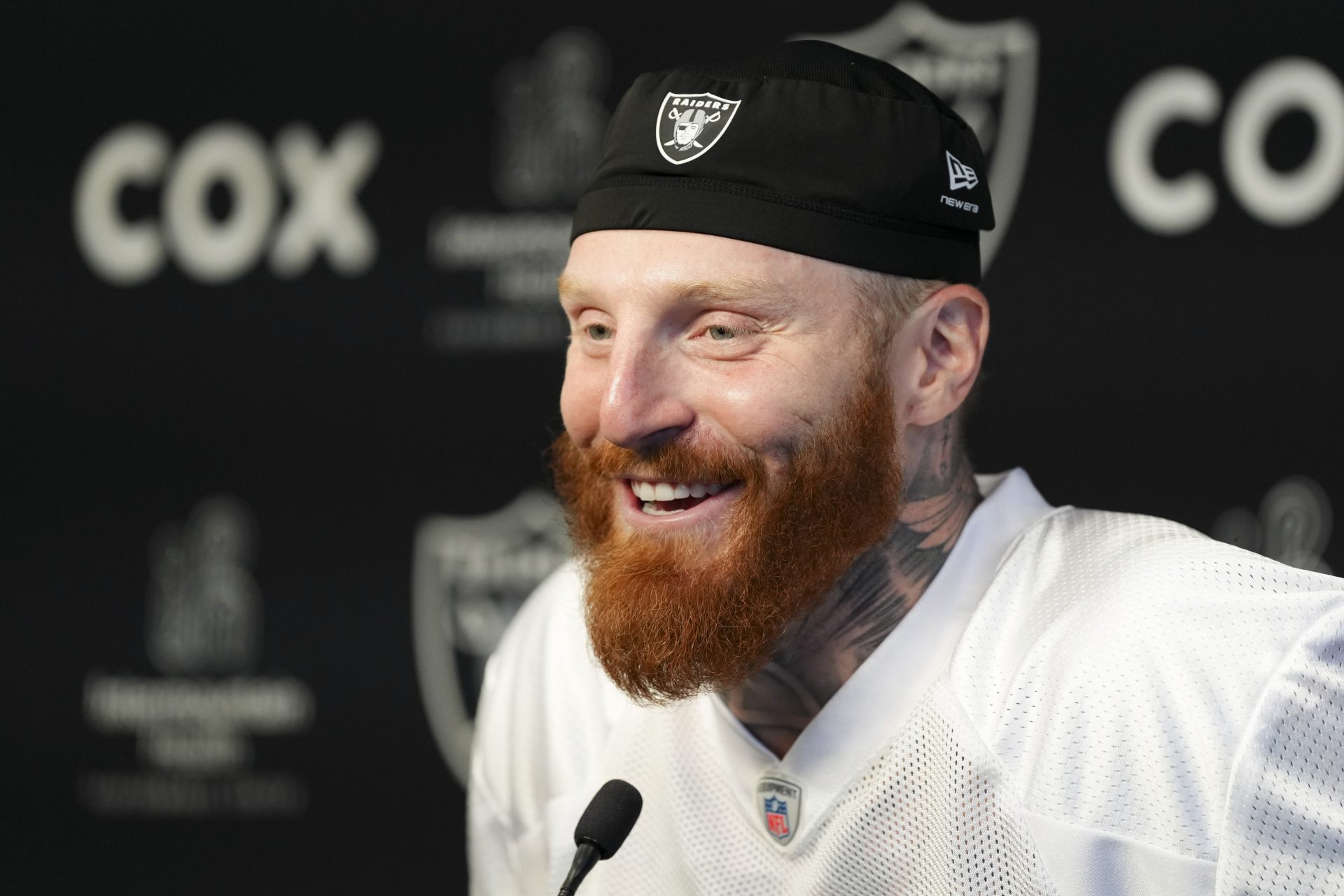 Las Vegas Raiders defensive end Maxx Crosby (98) speaks during a news conference during organized team activities at Intermountain Health Performance Center.