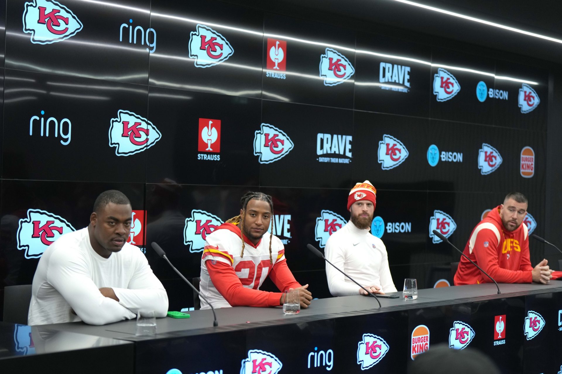 From left: Kansas City Chiefs defensive tackle Chris Jones, safety Justin Reid (20), place kicker Harrison Butker and tight end Travis Kelce (87) during press conference at DFB Campus. 
Source: Imagn