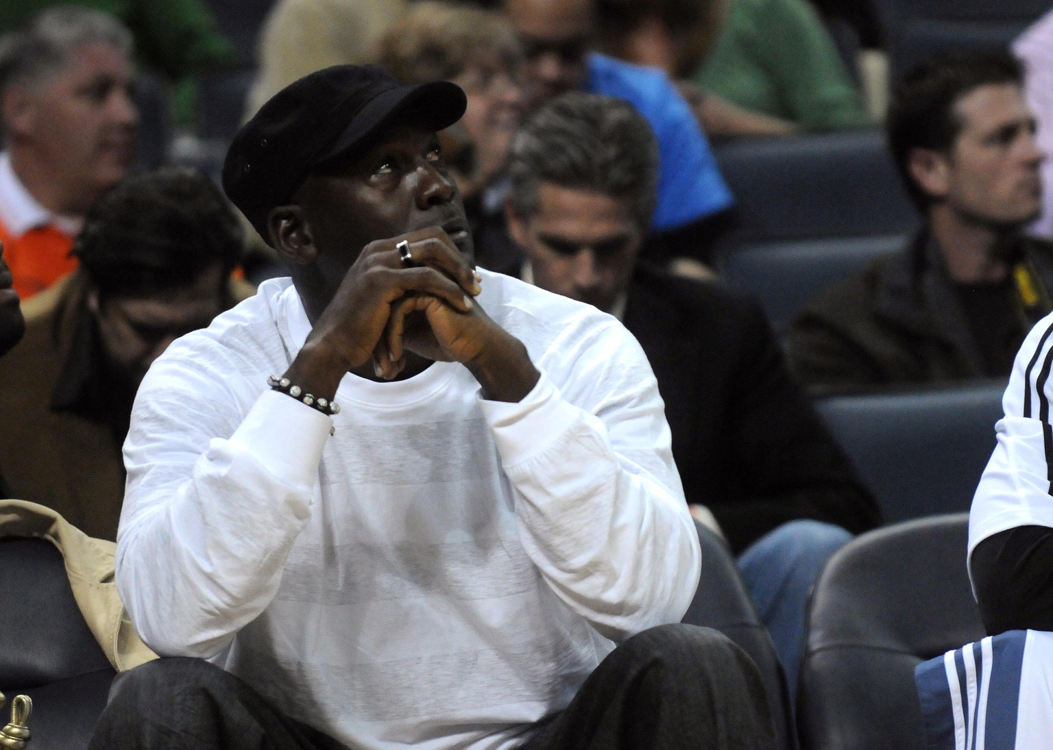 Charlotte Bobcats team co owner Michael Jordan watches on while playing against the Washington Wizards - Source: USA TODAY Sports