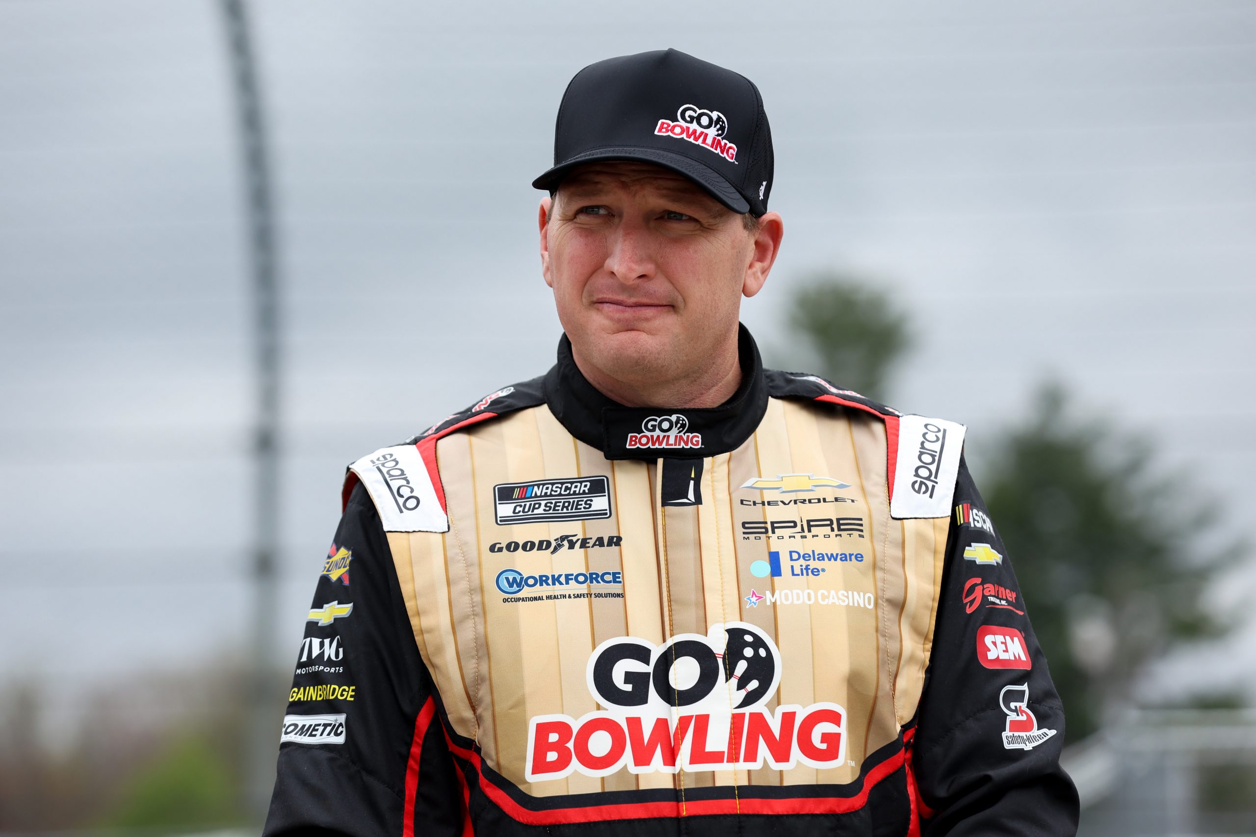 May 9, 2026; Watkins Glen, New York, USA; NASCAR Cup Series driver Michael McDowell looks on during practice and qualifying for the Go Bowling at The Glen at Watkins Glen International. Mandatory Credit: Matthew O'Haren-Imagn Images