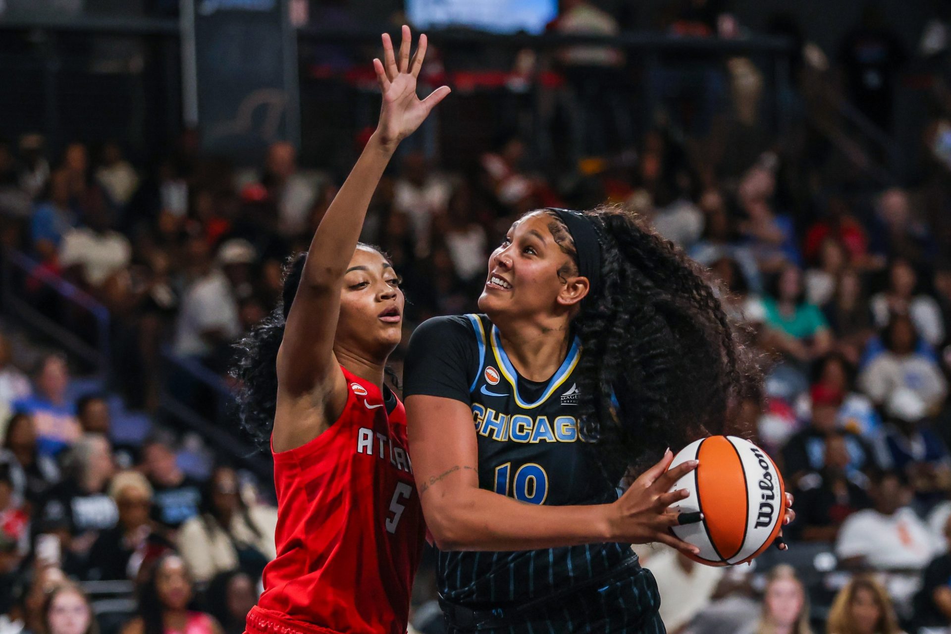Chicago Sky center Kamilla Cardoso (10) looks for a shot against Atlanta Dream forward Angel Reese (5) during the third quarter at Gateway Center Arena at College Park.