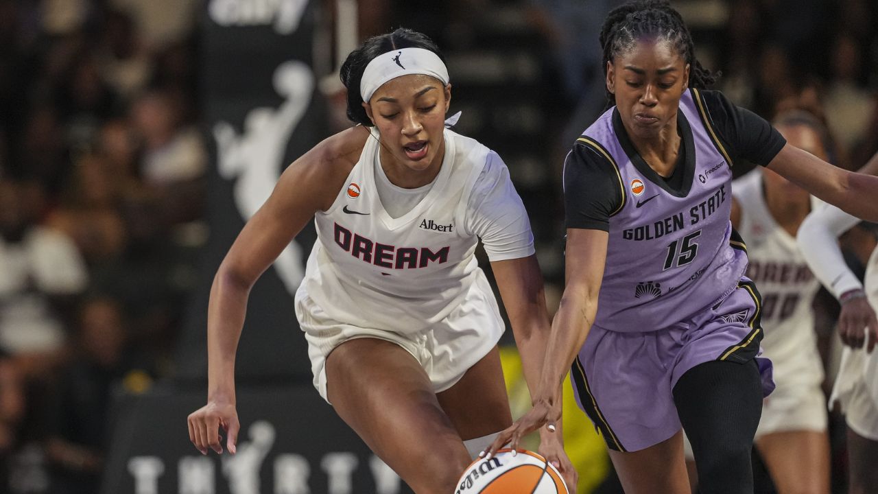 Atlanta Dream forward Angel Reese (5) and Golden State Valkyries guard Tiffany Hayes (15) fight for the ball during the first half - Source: Imagn Images