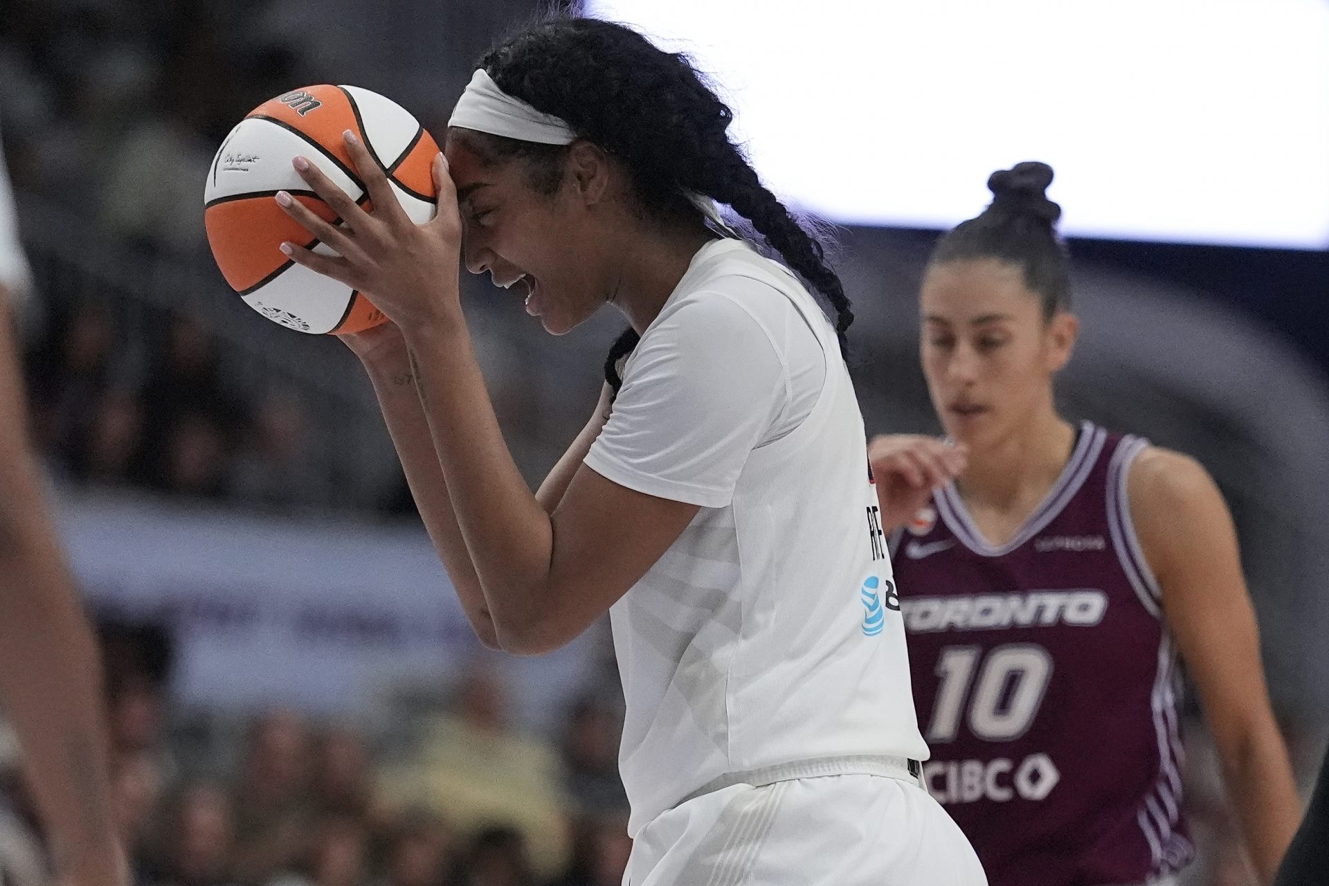 Atlanta Dream forward Angel Reese (5) reacts to an official’s call for the Toronto Tempo during the second half at Coca-Cola Coliseum.
