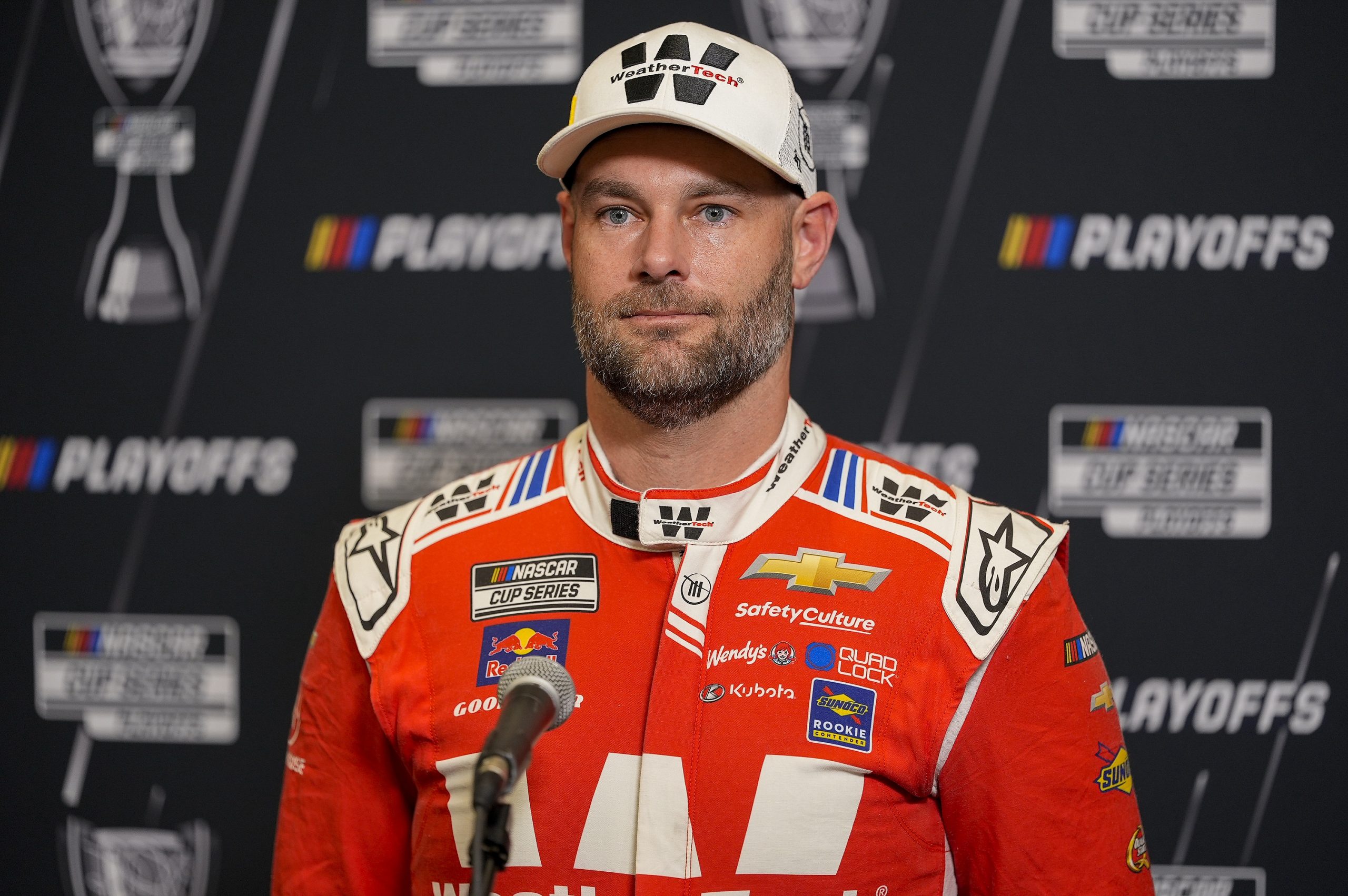 Aug 27, 2025; Charlotte, NC, USA; Shane van Gisbergen answers questions from the media during NASCAR Cup Series Playoff Media Day at Charlotte Convention Center. Mandatory Credit: Jim Dedmon-Imagn Images