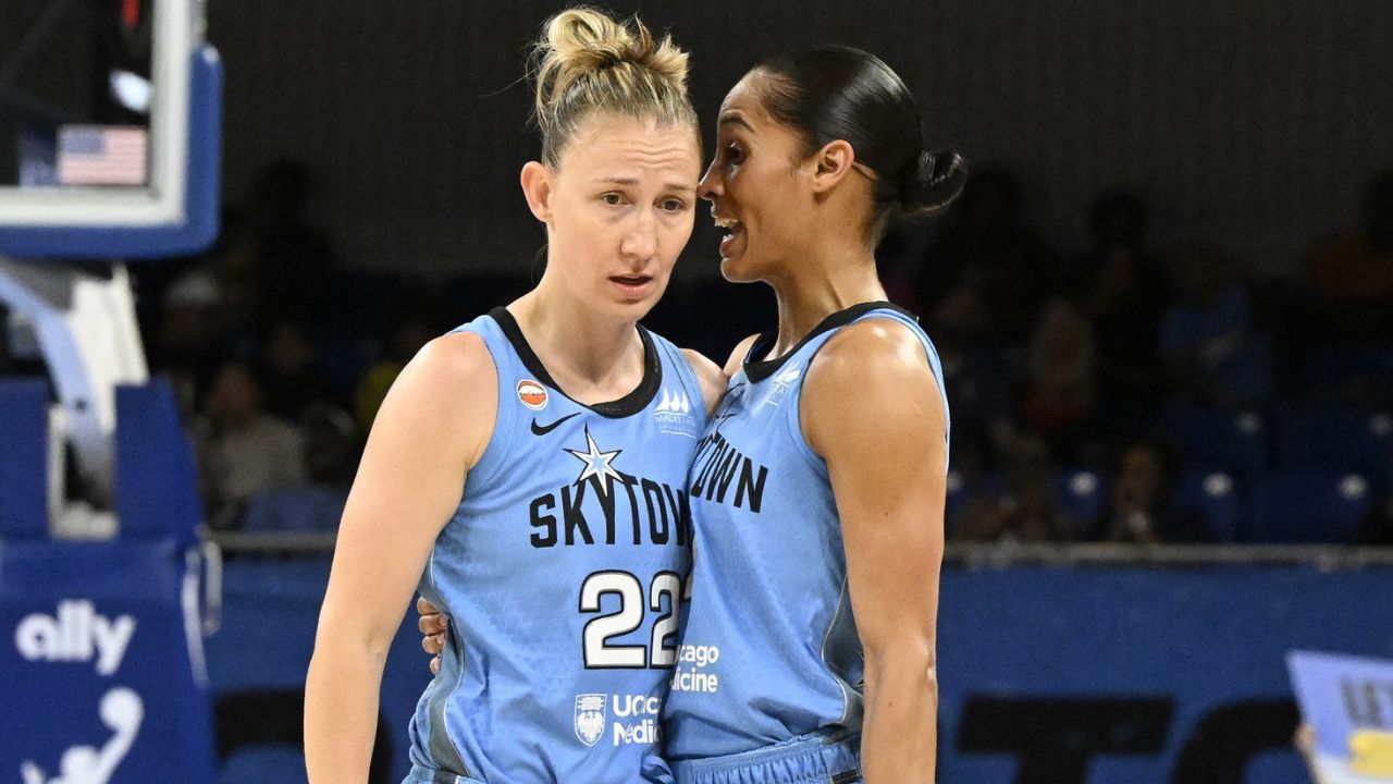 Chicago Sky guard Courtney Vandersloot (22) talks with guard Skylar Diggins (4) during the first half against the Portland Fire at Wintrust Arena - Source: Imagn Images