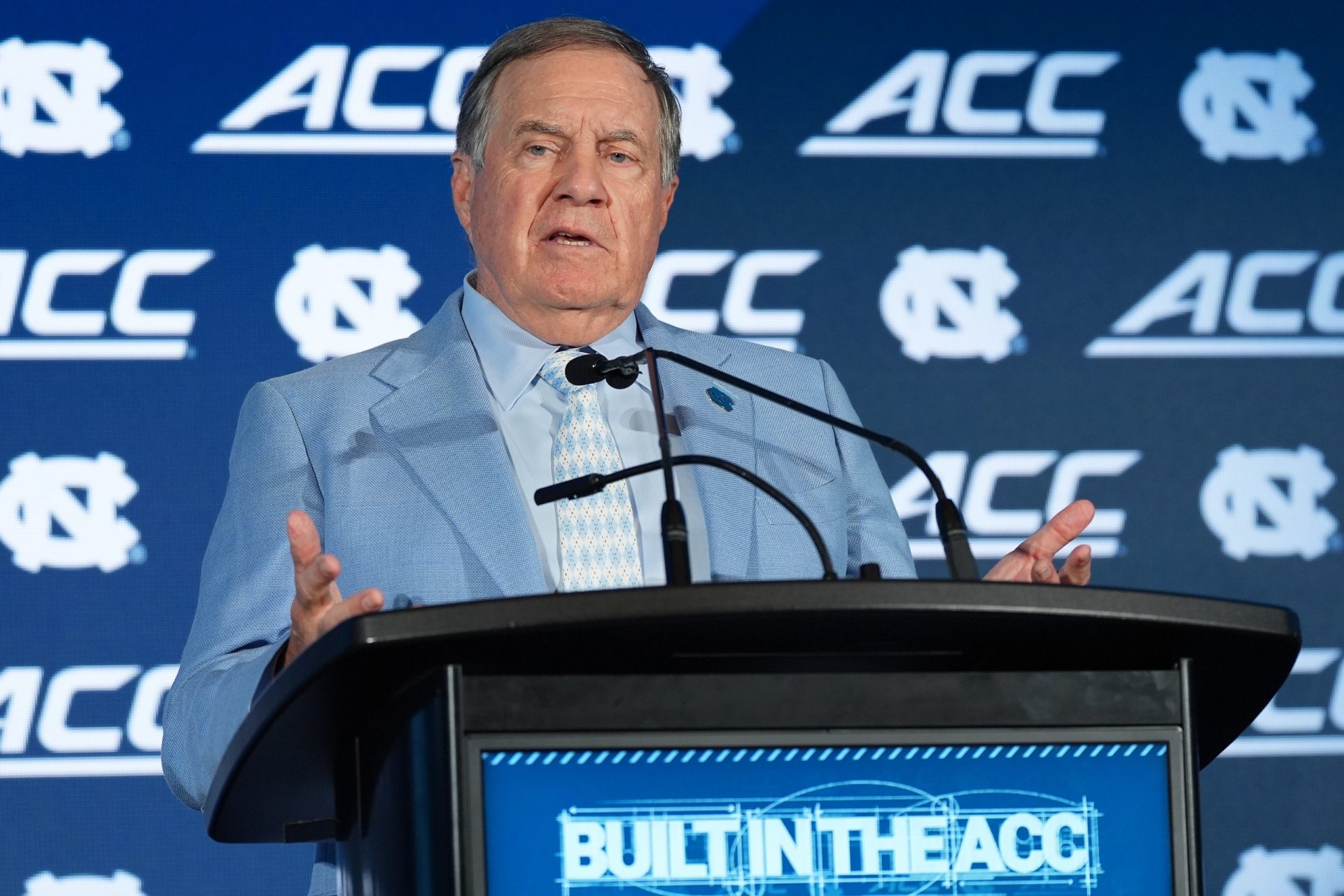 North Carolina head coach Bill Belichick talks with the media during interviews at Hilton Charlotte Uptown.