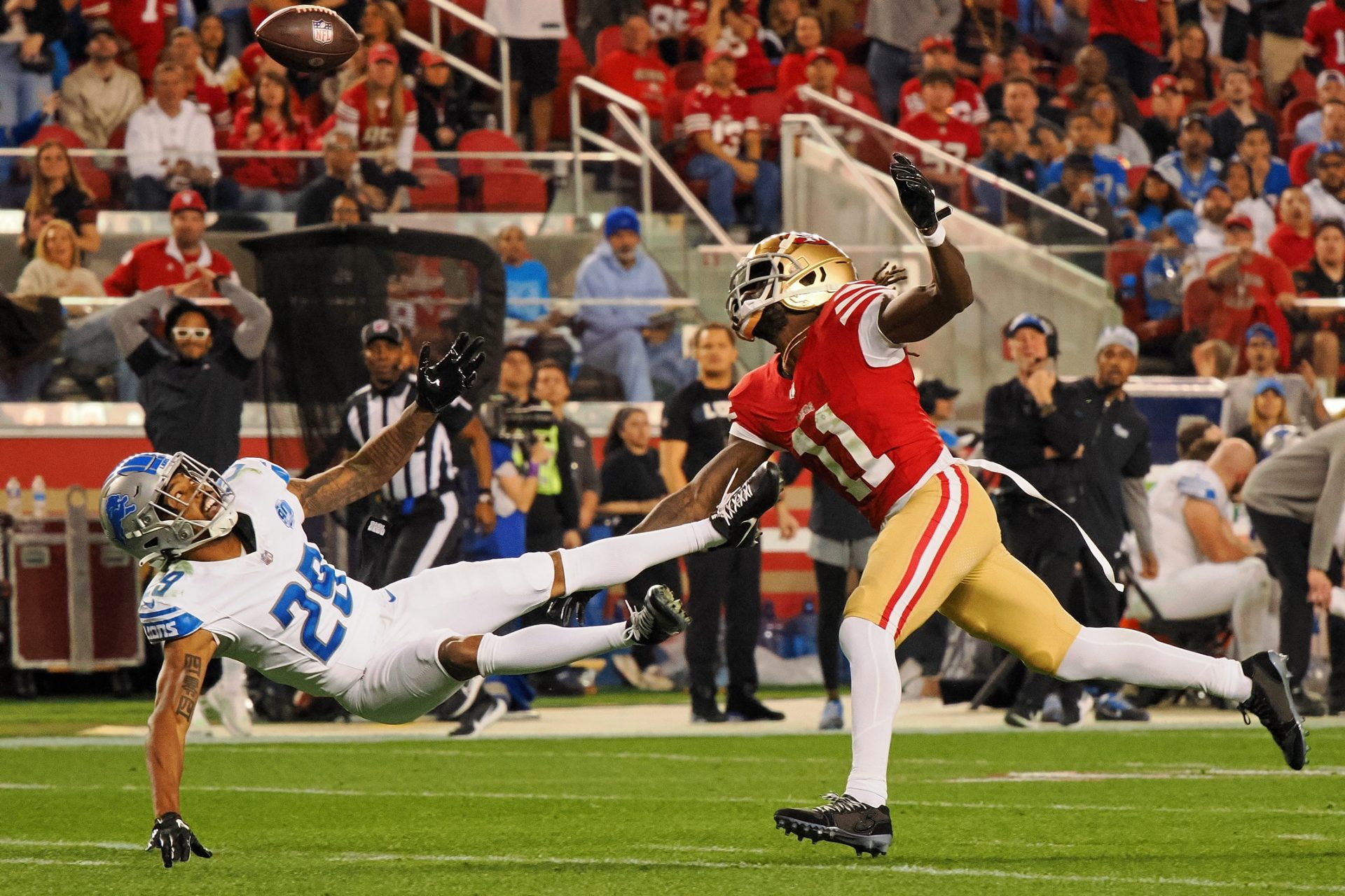 Detroit Lions cornerback Kindle Vildor (29) reacts after he was unable to catch the ball after it bounced off of his face mask on a pass intended for San Francisco 49ers wide receiver Brandon Aiyuk (11) during the second half of the NFC Championship football game at Levi's Stadium.