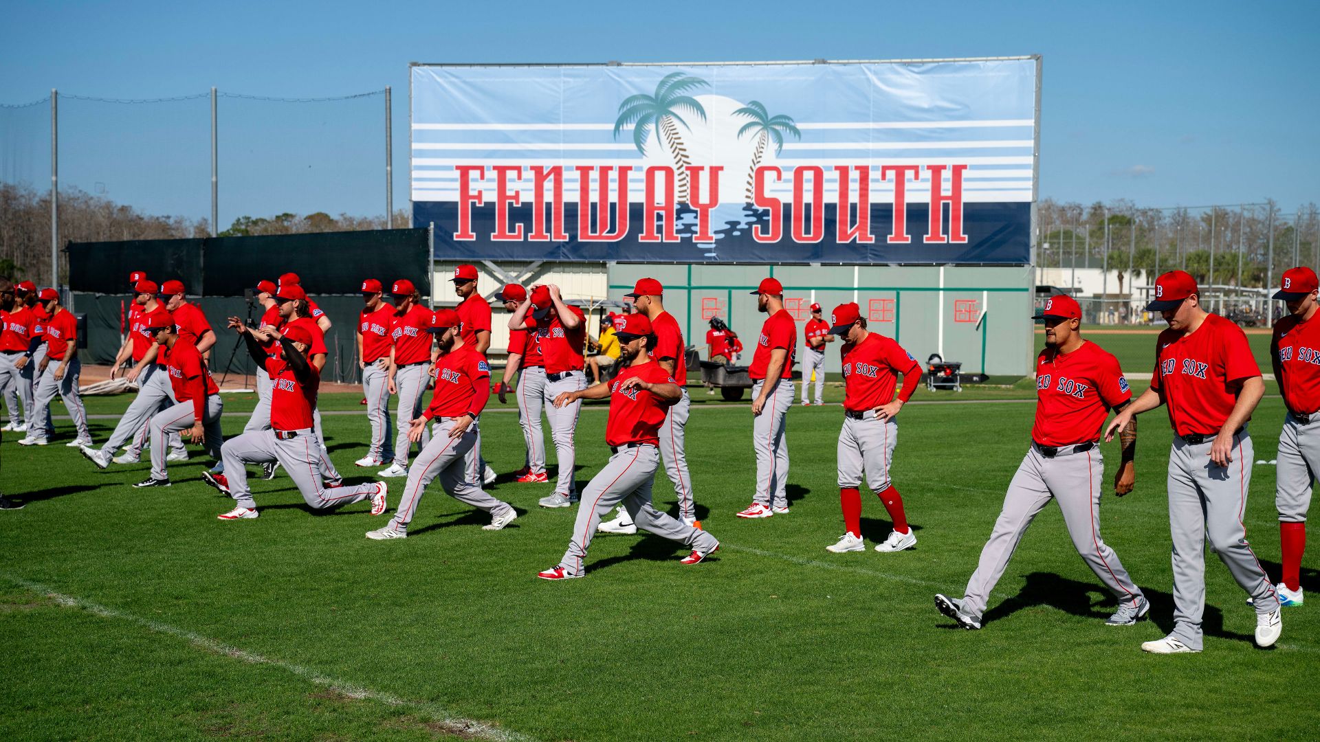 Boston Red Sox players warm up as a team before spring training at Jet Blue Park at Fenway South. Source: IMAGN