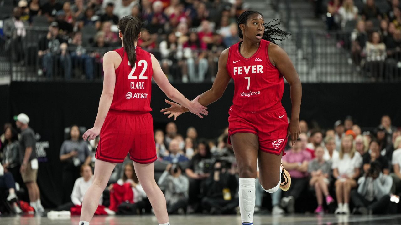 Indiana Fever center Aliyah Boston (7) celebrates with guard Caitlin Clark (22) after scoring against the Las Vegas Aces - Source: Imagn Images